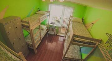 Фото номера Кровать в общем четырехместном номере для мужчин Гостиница Ostrova Hostel г. Южно-Сахалинск 4