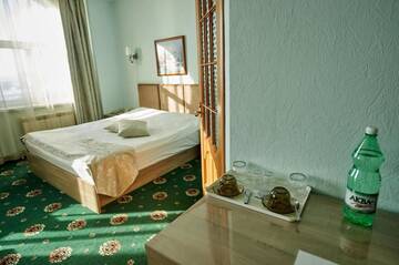 Фото номера Стандартный двухместный люкс с 1 кроватью Гостиница Imperial Palace Hotel г. Южно-Сахалинск 13