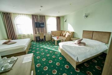 Фото номера Двухместный номер с 2 отдельными кроватями Гостиница Imperial Palace Hotel г. Южно-Сахалинск 3