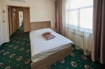 Фото номера Стандартный одноместный номер Гостиница Imperial Palace Hotel г. Южно-Сахалинск 2